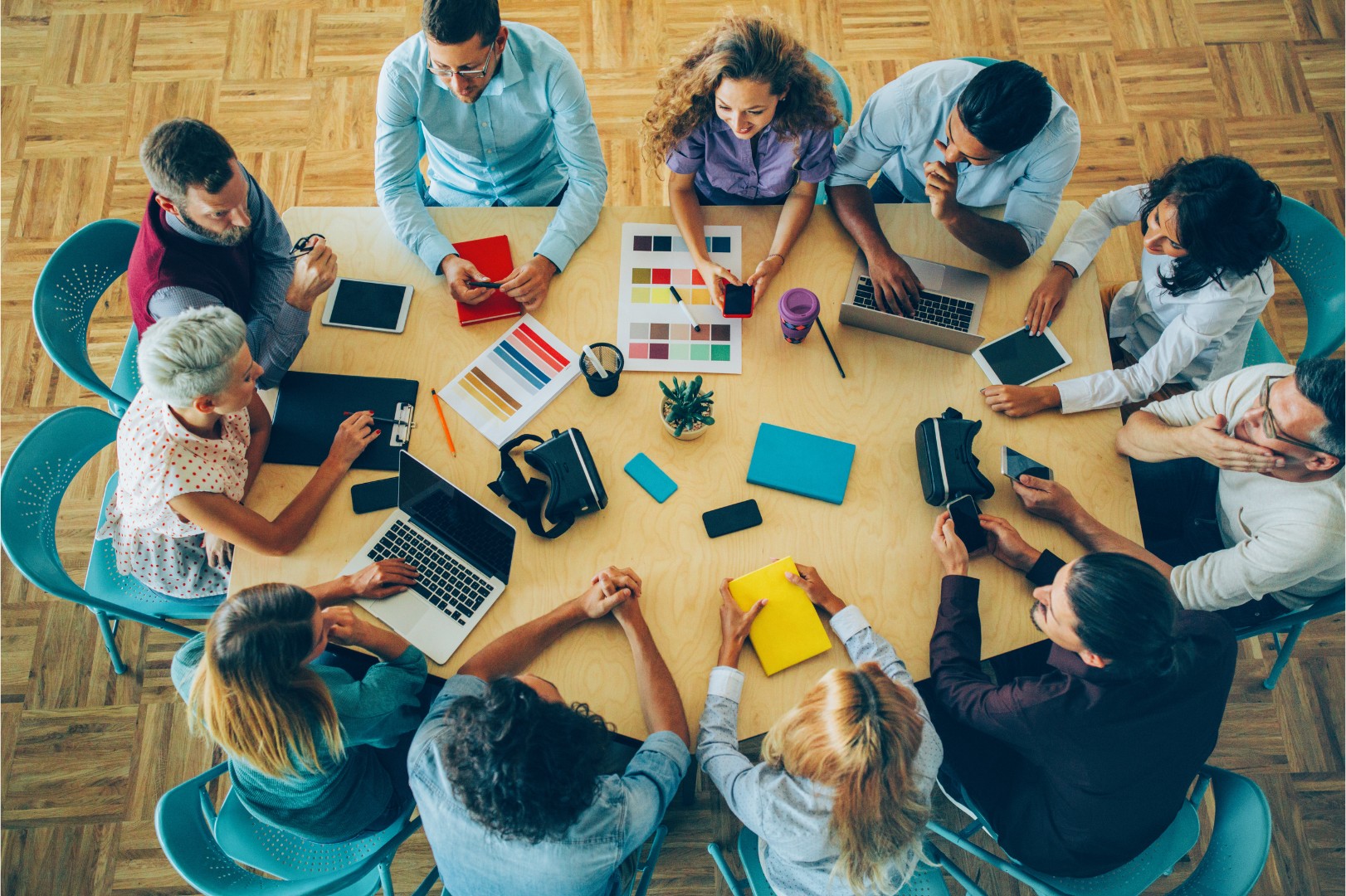 A team gathered in circle, working together