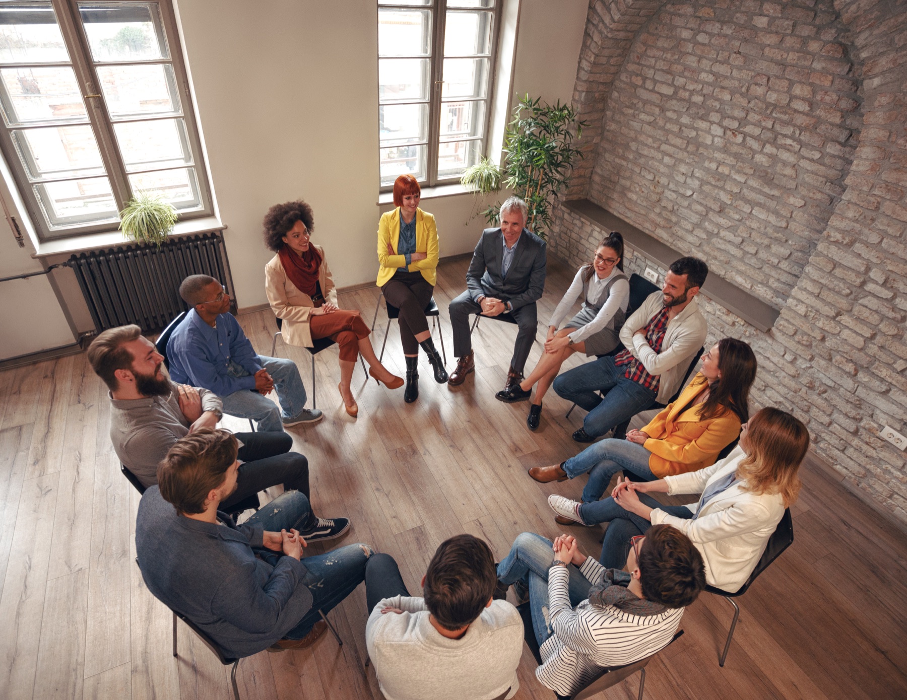 People seated together in a circle